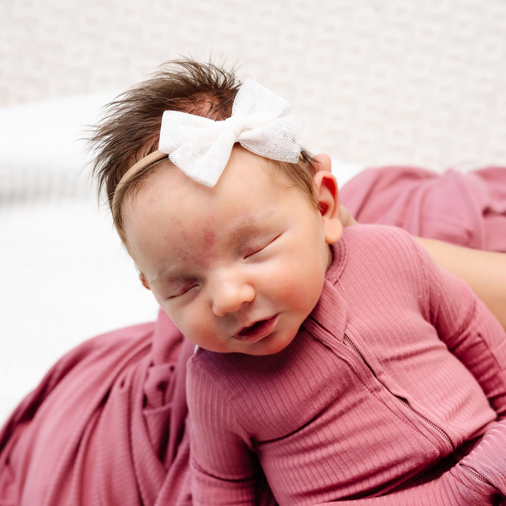 Marjorie Zipper Footies newborn girl in newborn size close up