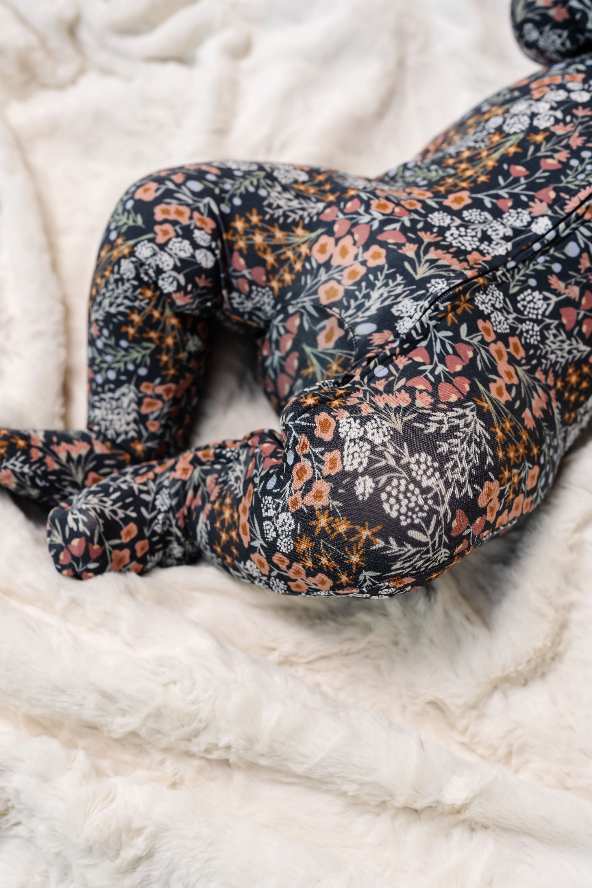 bea zipper footie close up on print and zipper