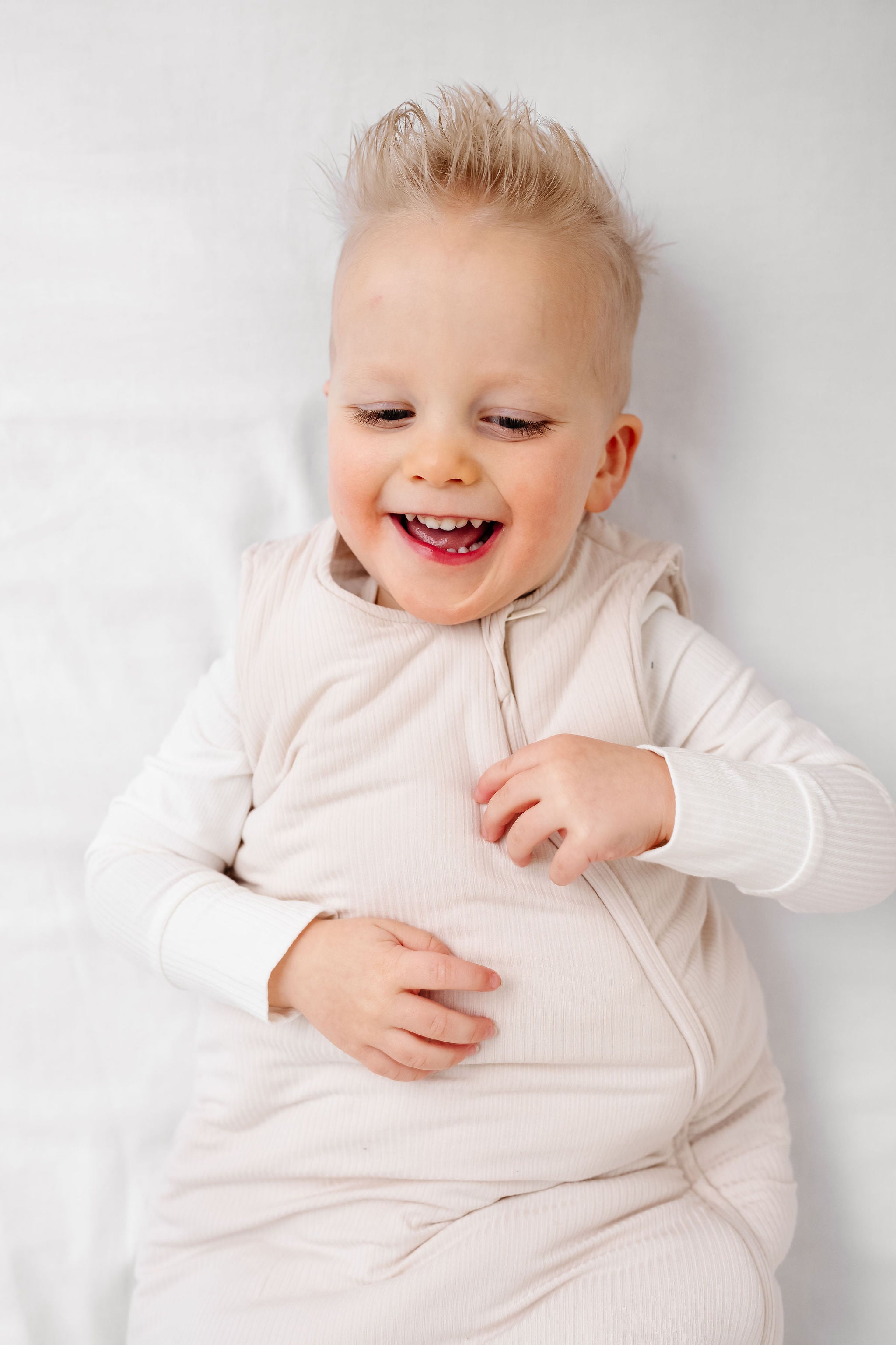 cove sleep sack toddler boy close up on fabric