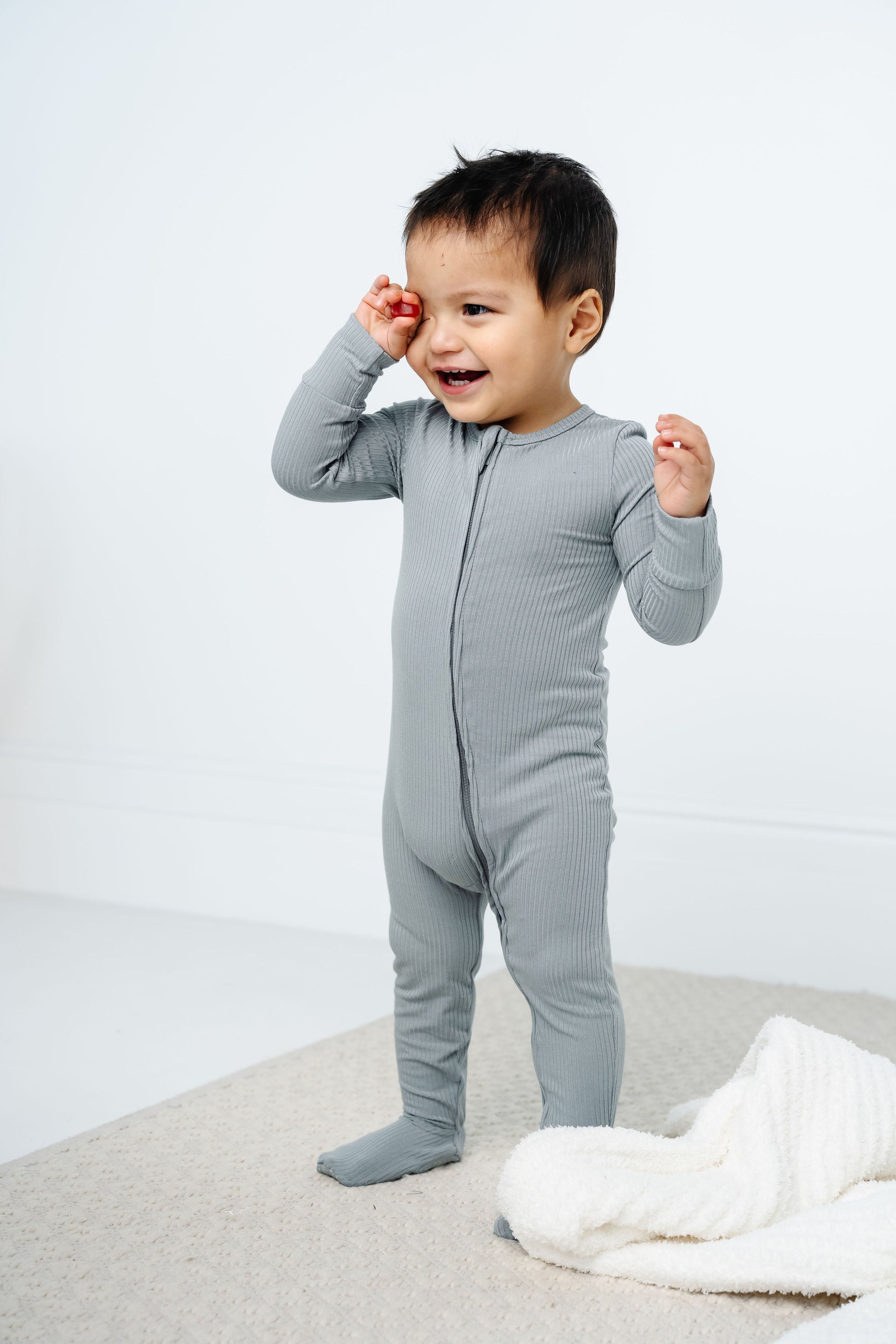 ford zipper footies toddler boy standing and smiling wearing 12-24 month size