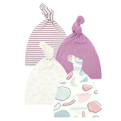 A collection of four top knot hats for babies, displayed in a variety of patterns and colors, with a promotional 70% off label.