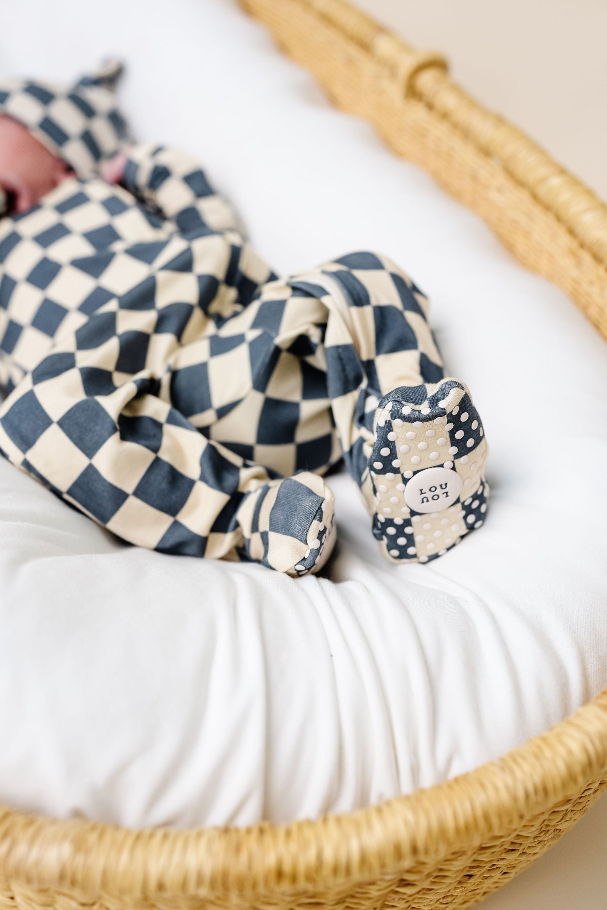 miles zipper footies close up on grip