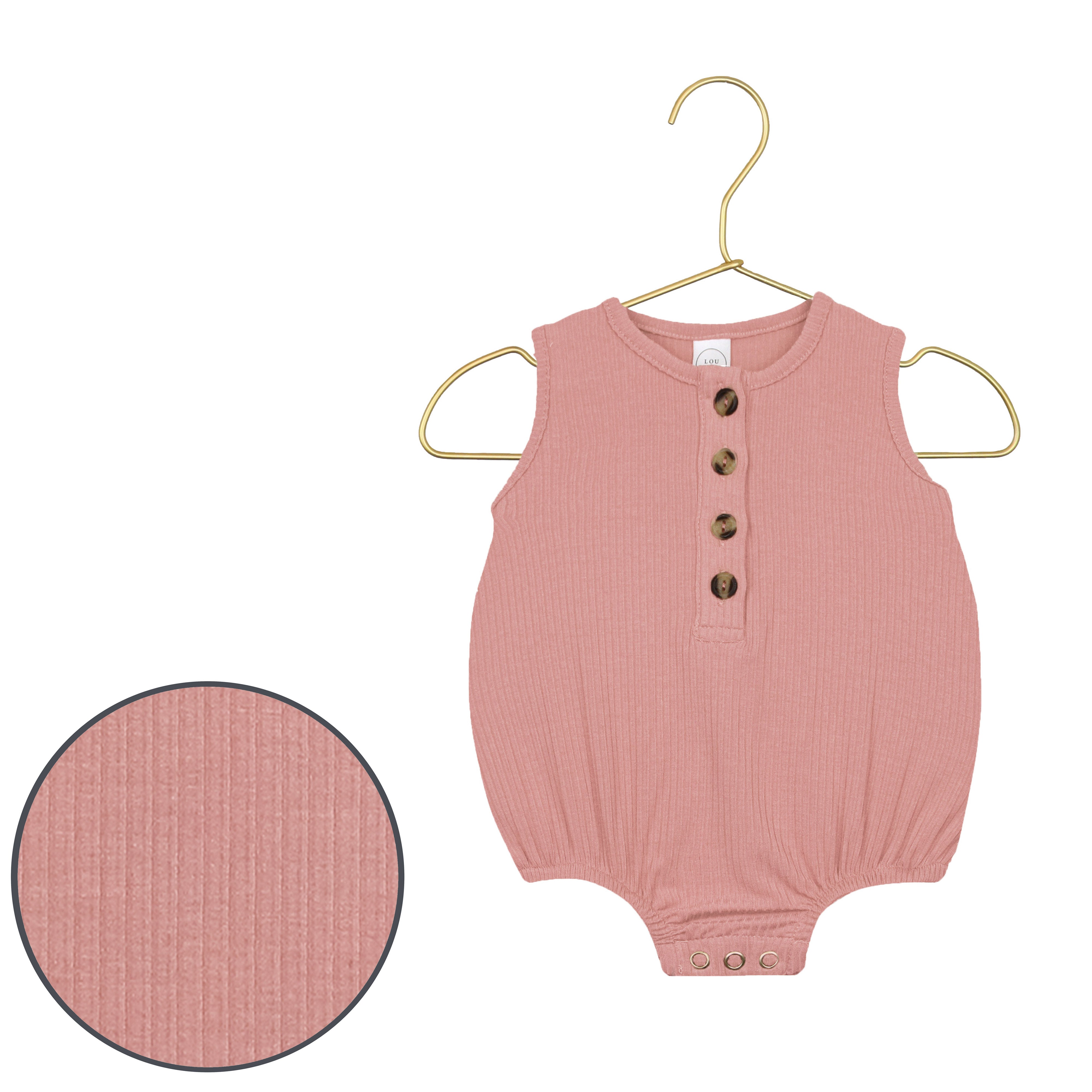Pink baby romper with button details on a hanger against a white background