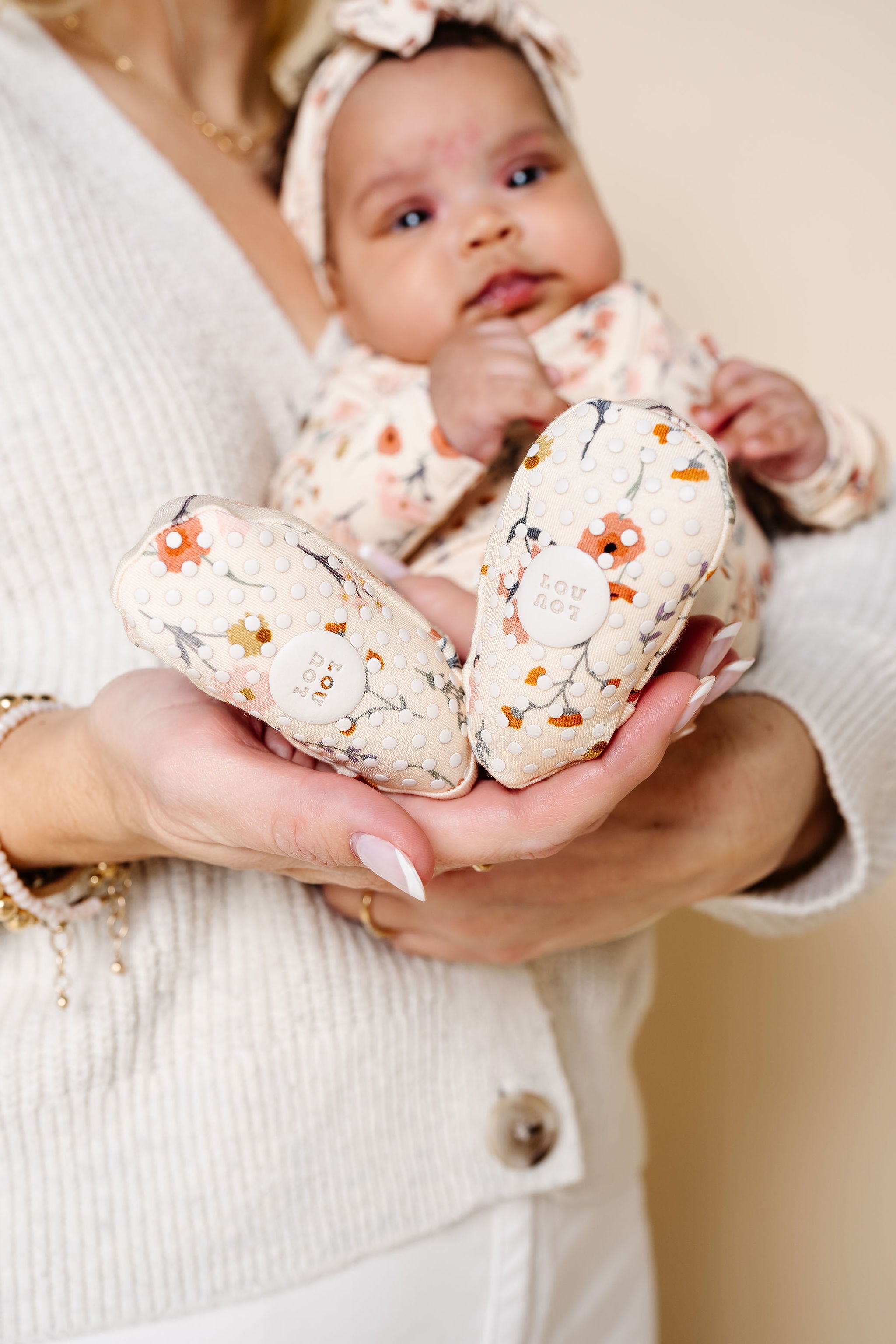 rachel zipper footies close up on grip footies newborn girl