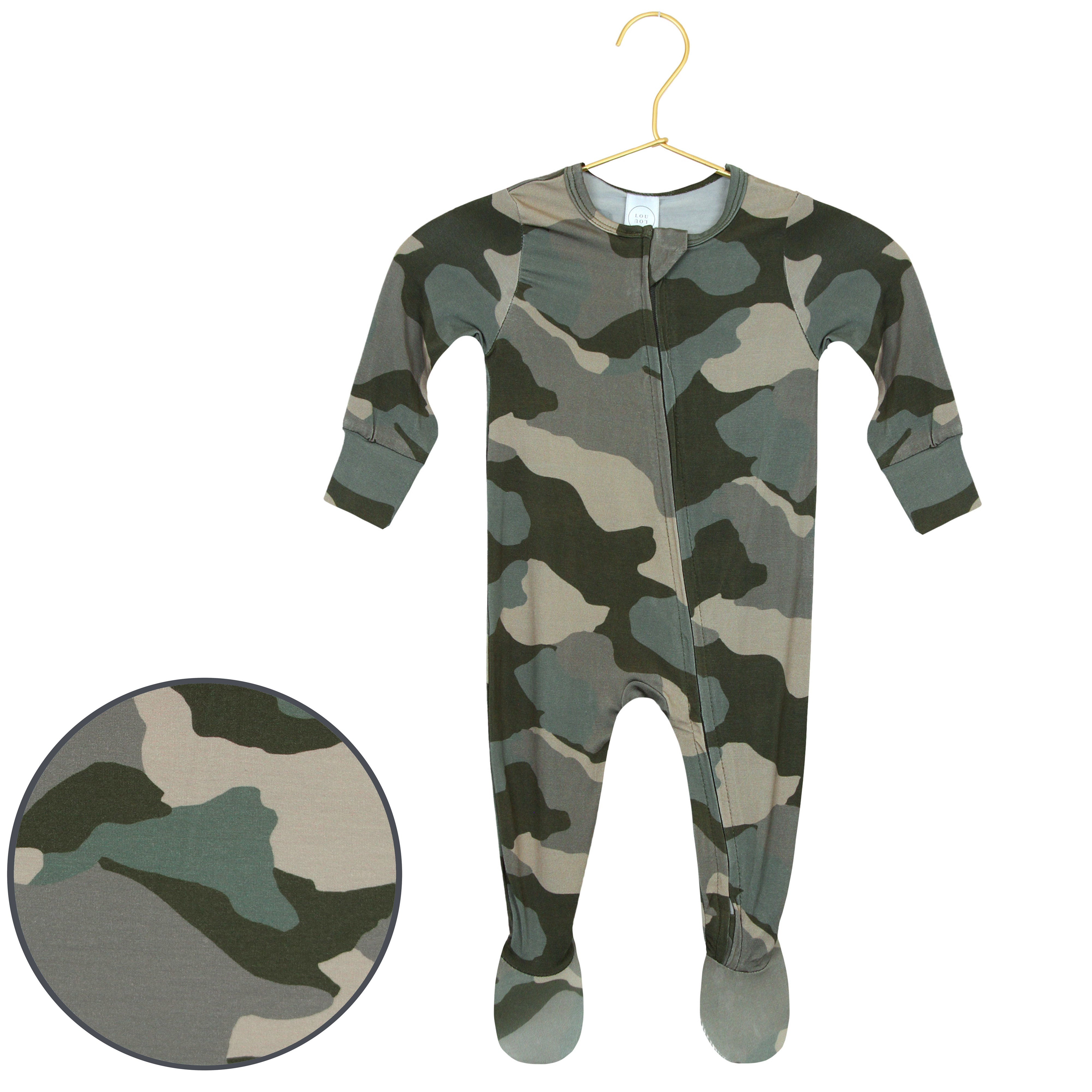 Camouflage-patterned baby onesie on a hanger with a close-up of the pattern.