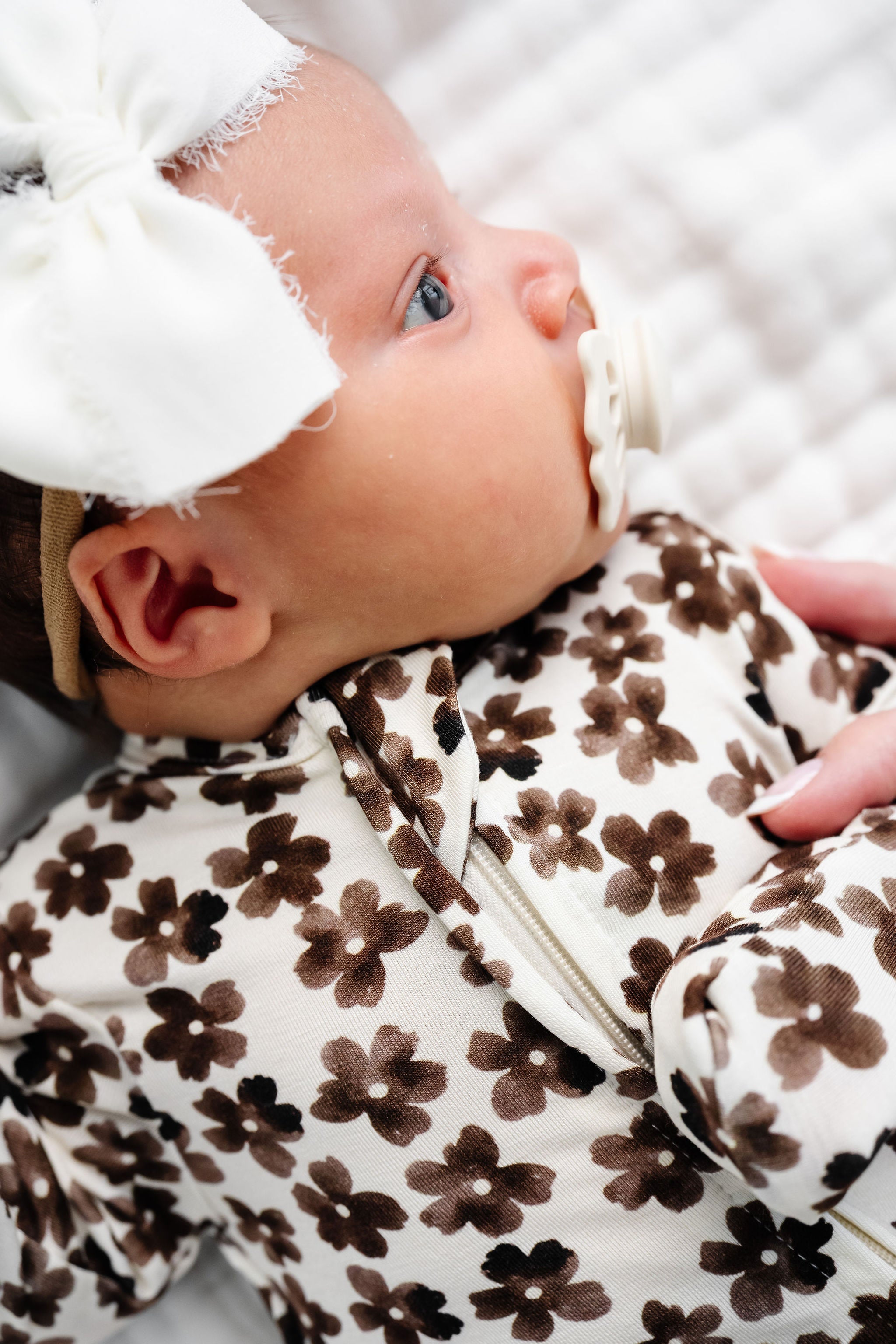 sloane zipper footies zoom up on zipper detail