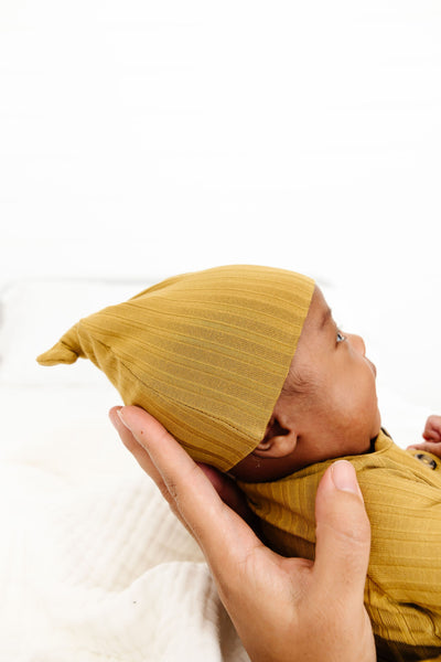 Merrick Ribbed Top Knot Hat