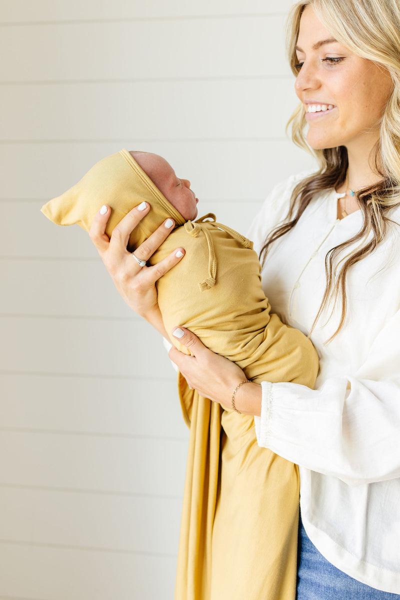 Sutton Top Knot Hat